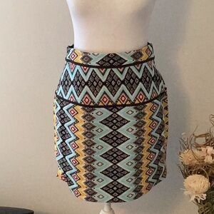 Petite “LOFT” skirt with shades of teal, yellow, red, and black